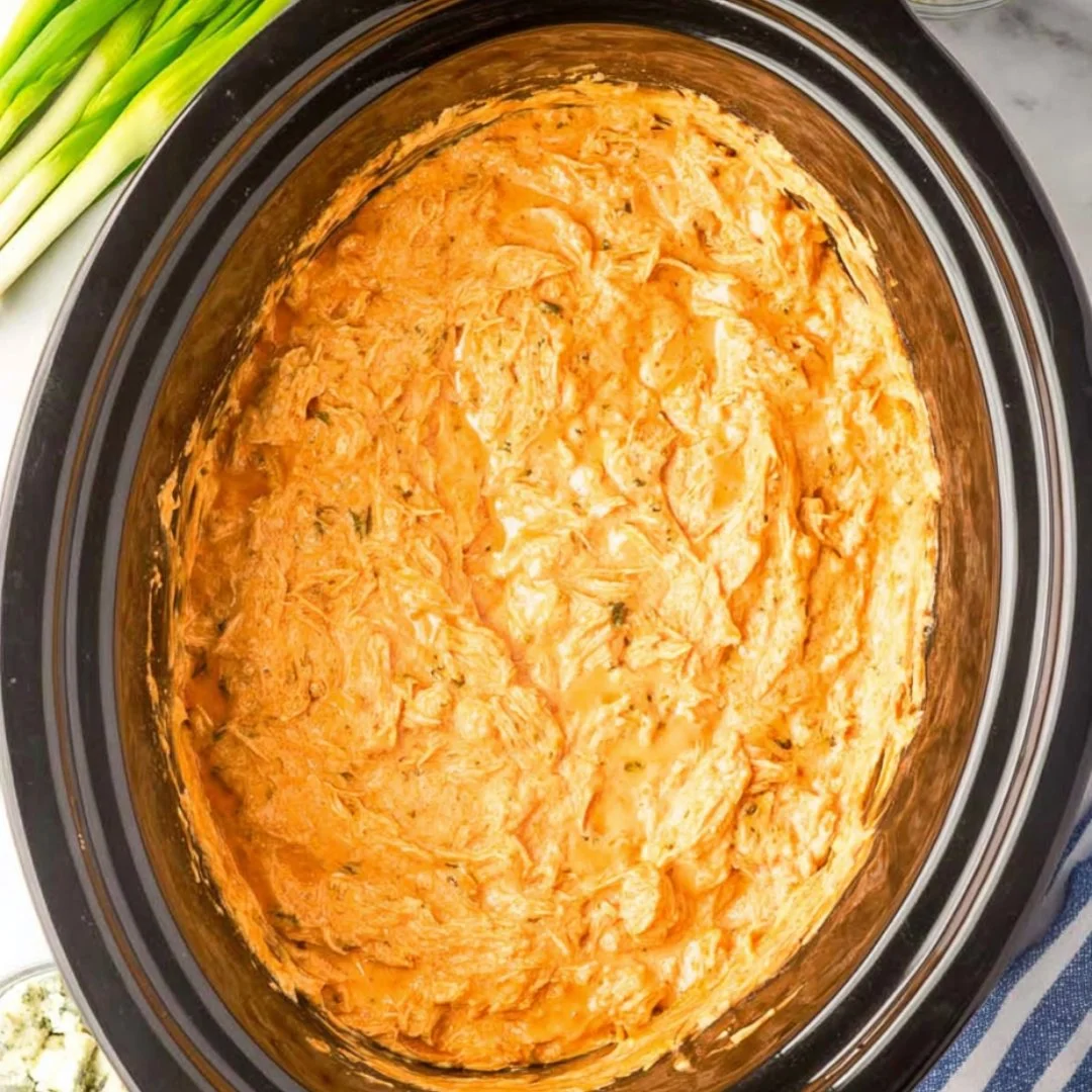 Delicious Crockpot Buffalo Chicken Dip served in a bowl with tortilla chips