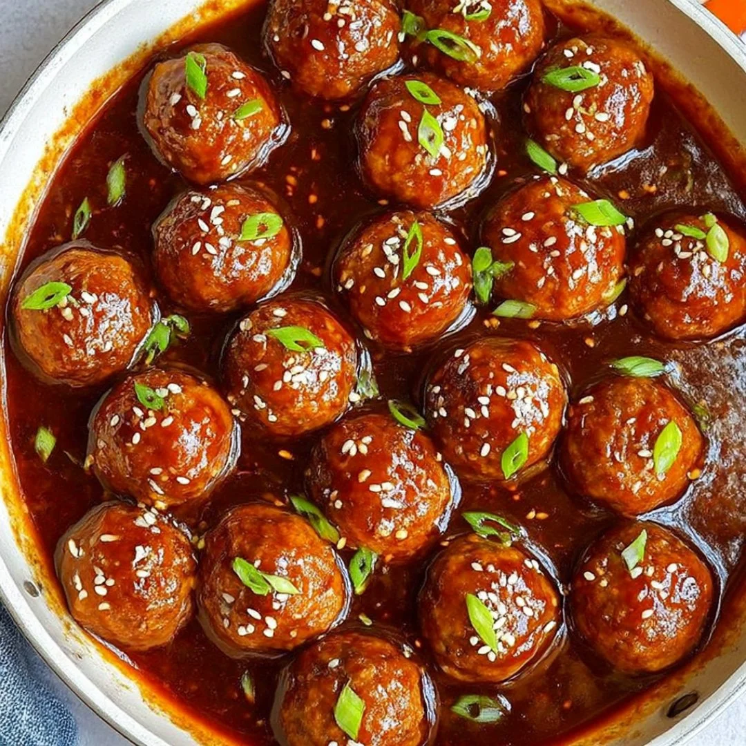 Delicious Asian glazed meatballs served with garnish