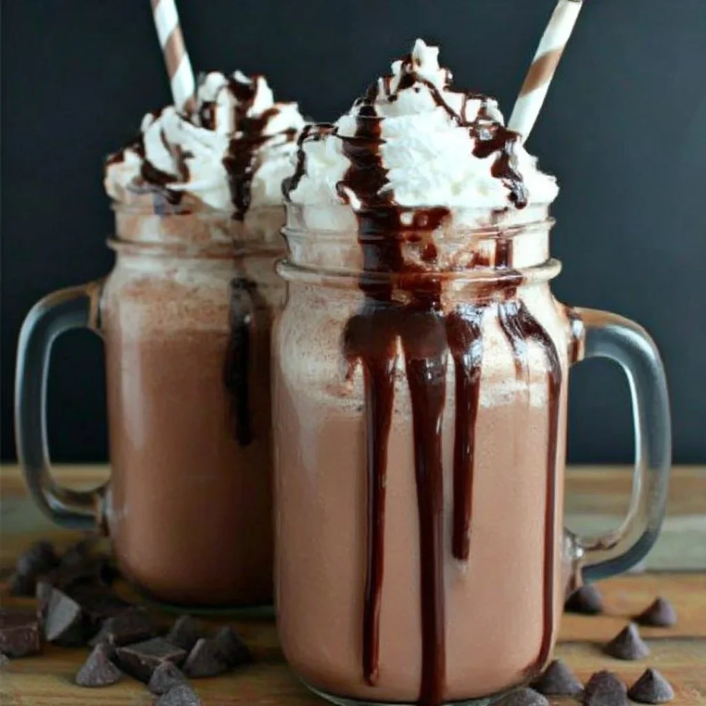 Delicious frozen hot chocolate topped with whipped cream in a glass