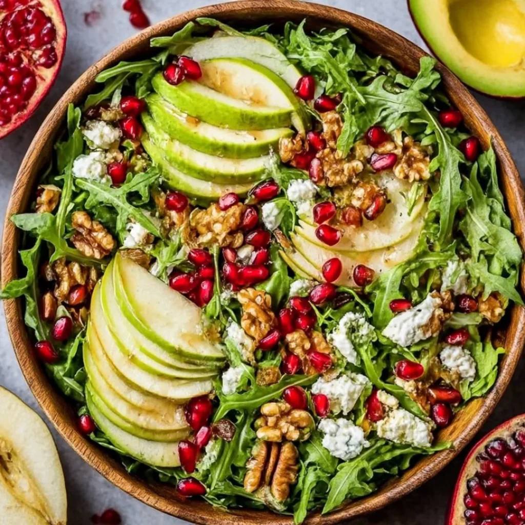 Tasty Christmas Salad topped with honey mustard dressing in a festive setting.