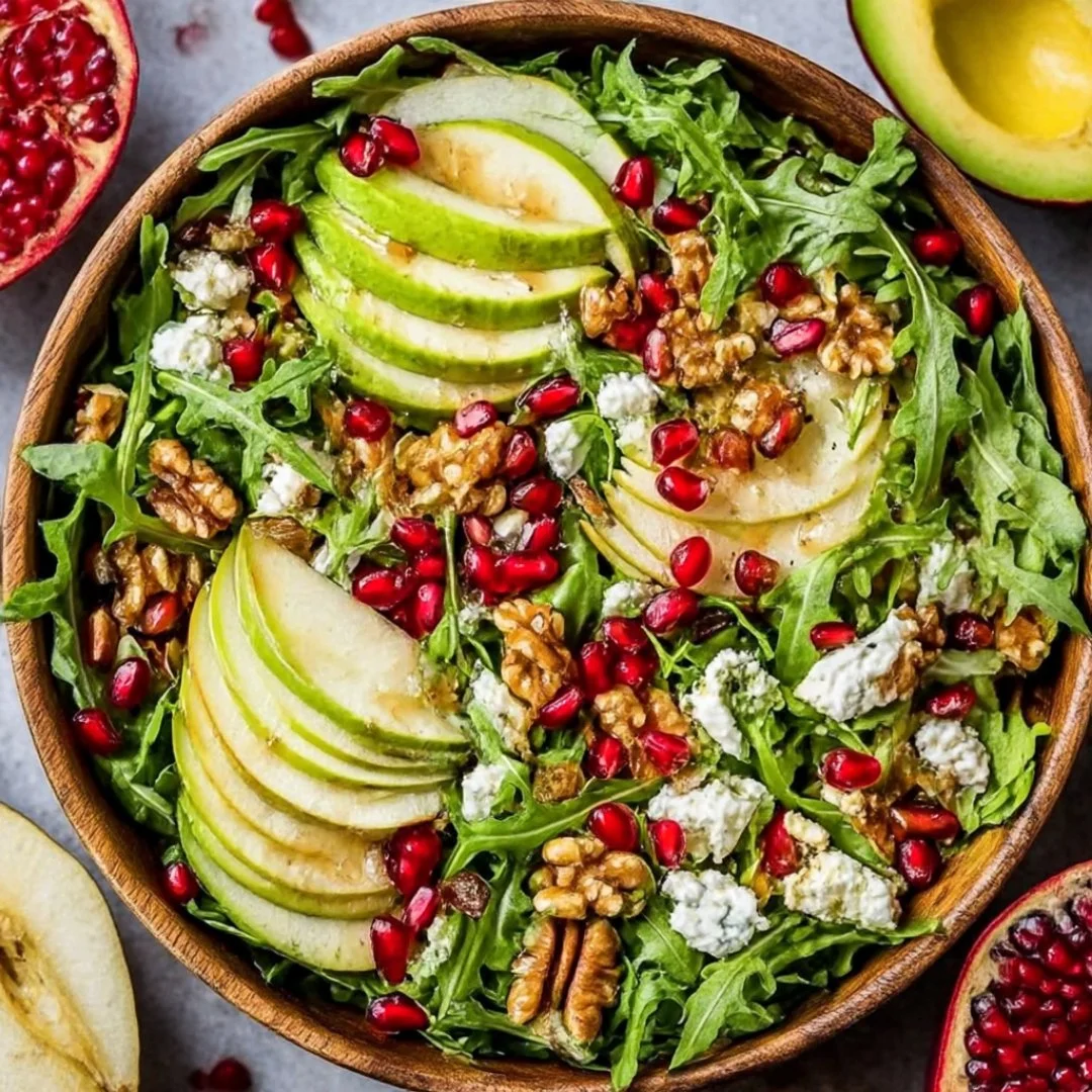Tasty Christmas Salad topped with honey mustard dressing in a festive setting.