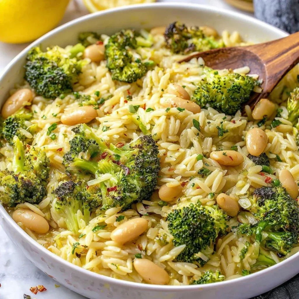 Plate of Broccoli Orzo with White Beans, Lemon, and Parmesan