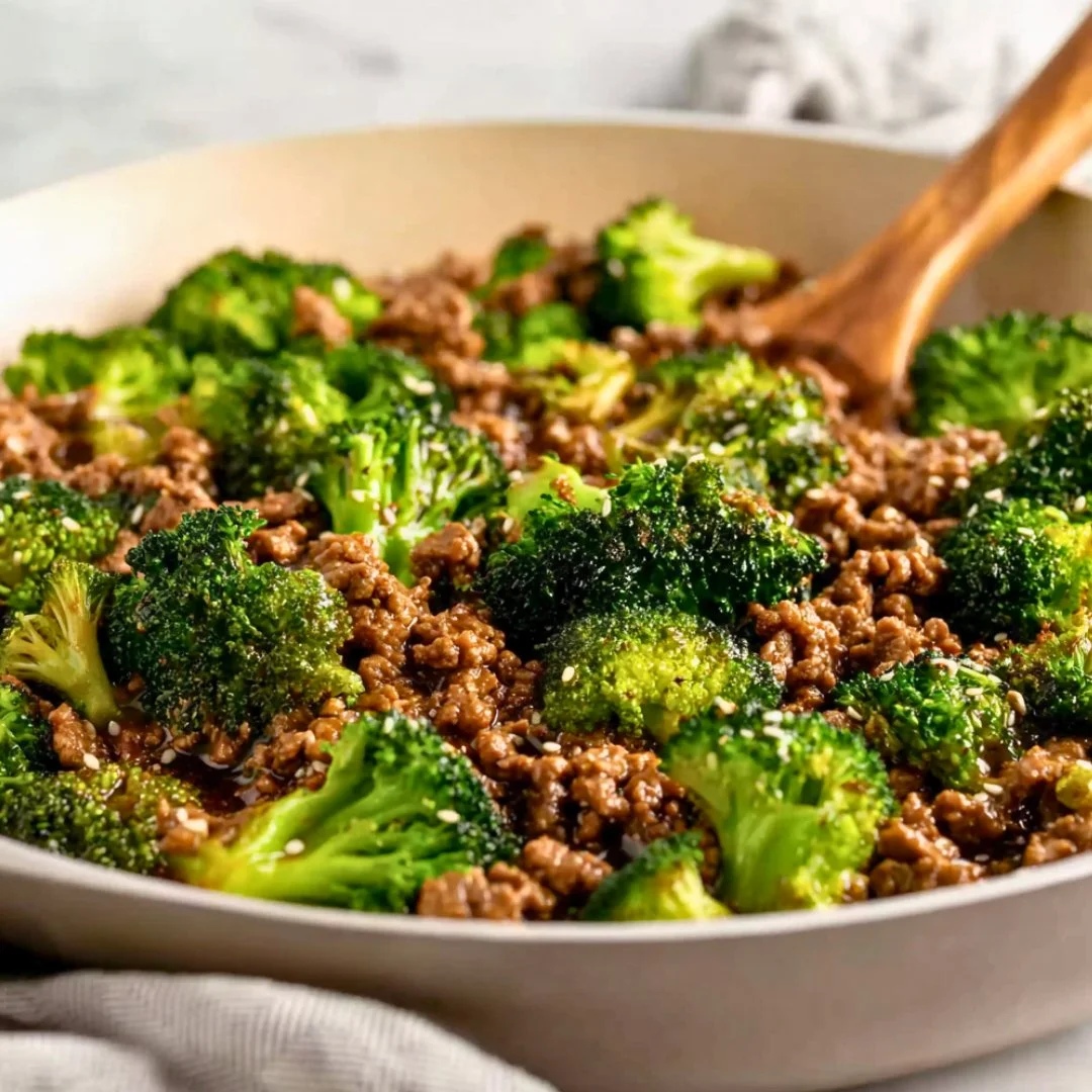 Easy keto ground beef and broccoli dish prepared in a skillet.