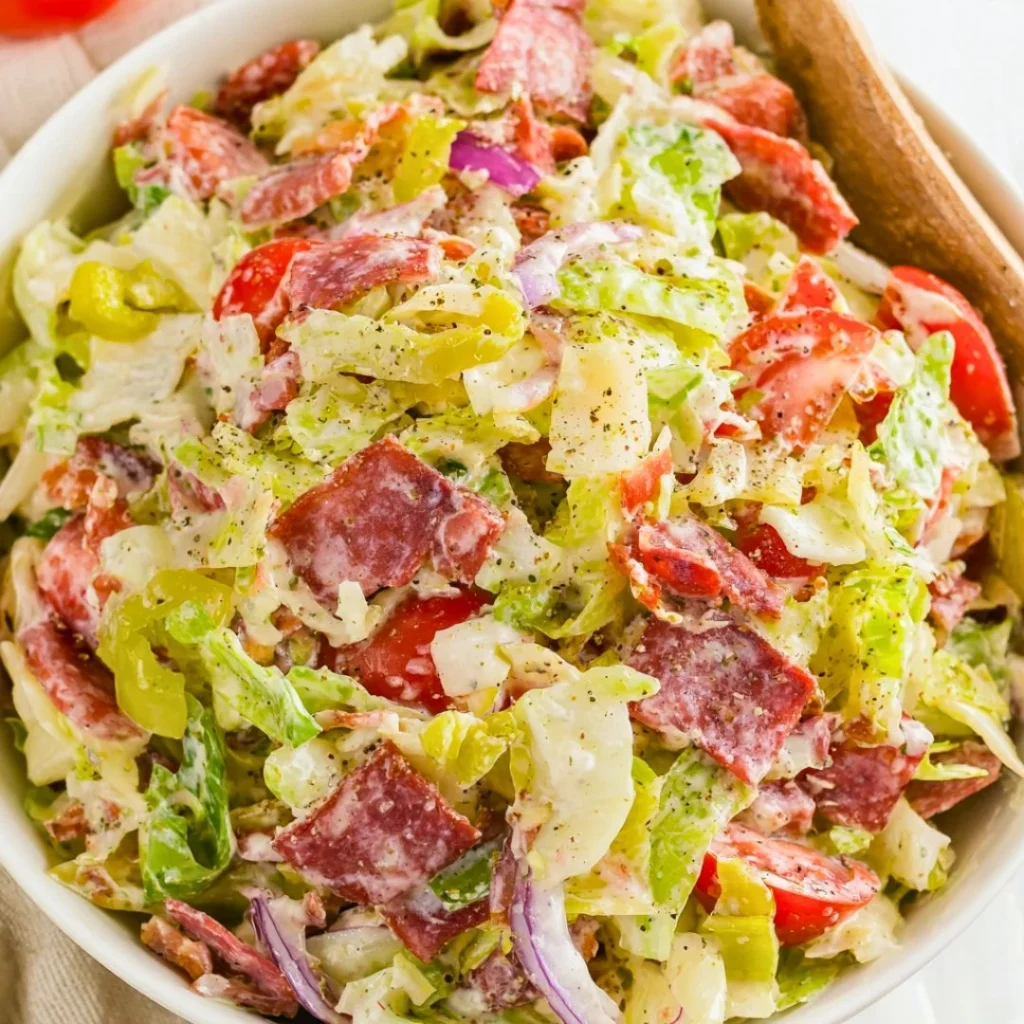 Colorful Italian Grinder Salad featuring chopped vegetables and Italian meats