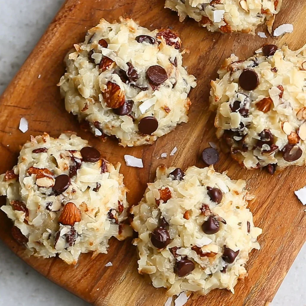 Freshly baked Almond Coconut Cookies with almonds and coconut flakes