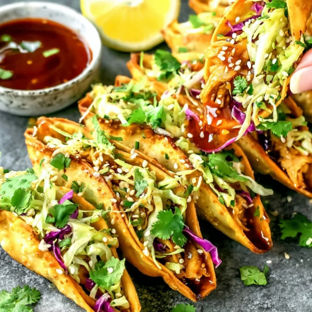 Applebee's Chicken Wonton Tacos served with a flavorful dipping sauce