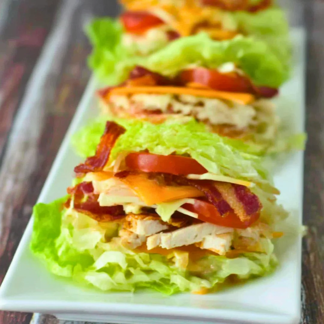 Low Carb Chicken Club Sandwich with fresh ingredients and crispy bacon