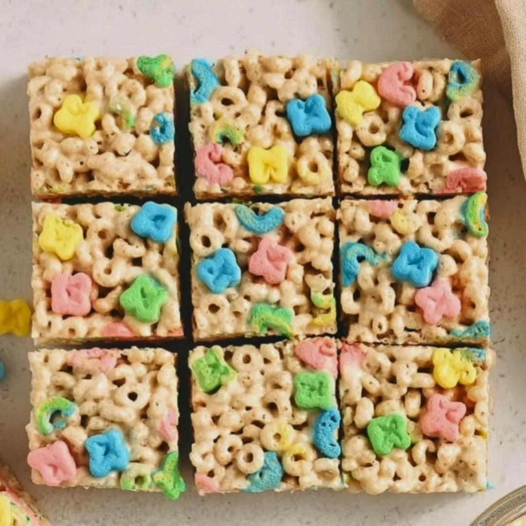 Gluten-free Lucky Charms Treats stacked on a plate