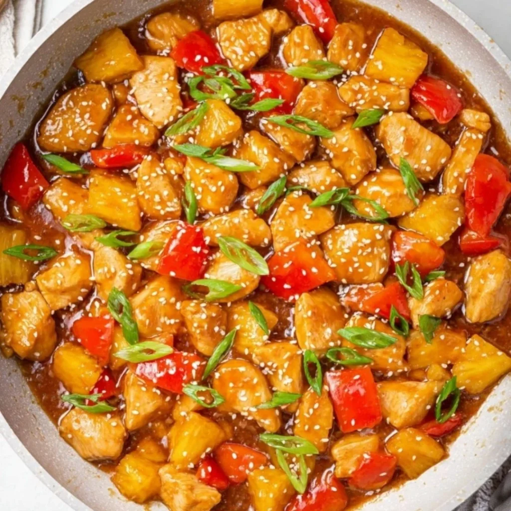 Hawaiian Chicken Stir Fry with colorful vegetables and pineapple chunks