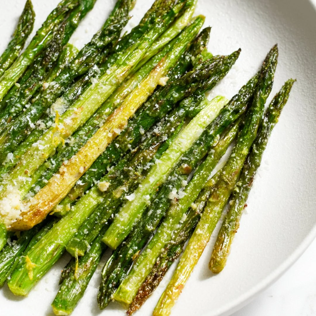 Delicious cheesy roasted asparagus served as a savory side dish