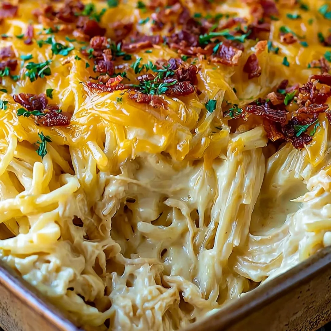 Creamy chicken spaghetti casserole served in a baking dish