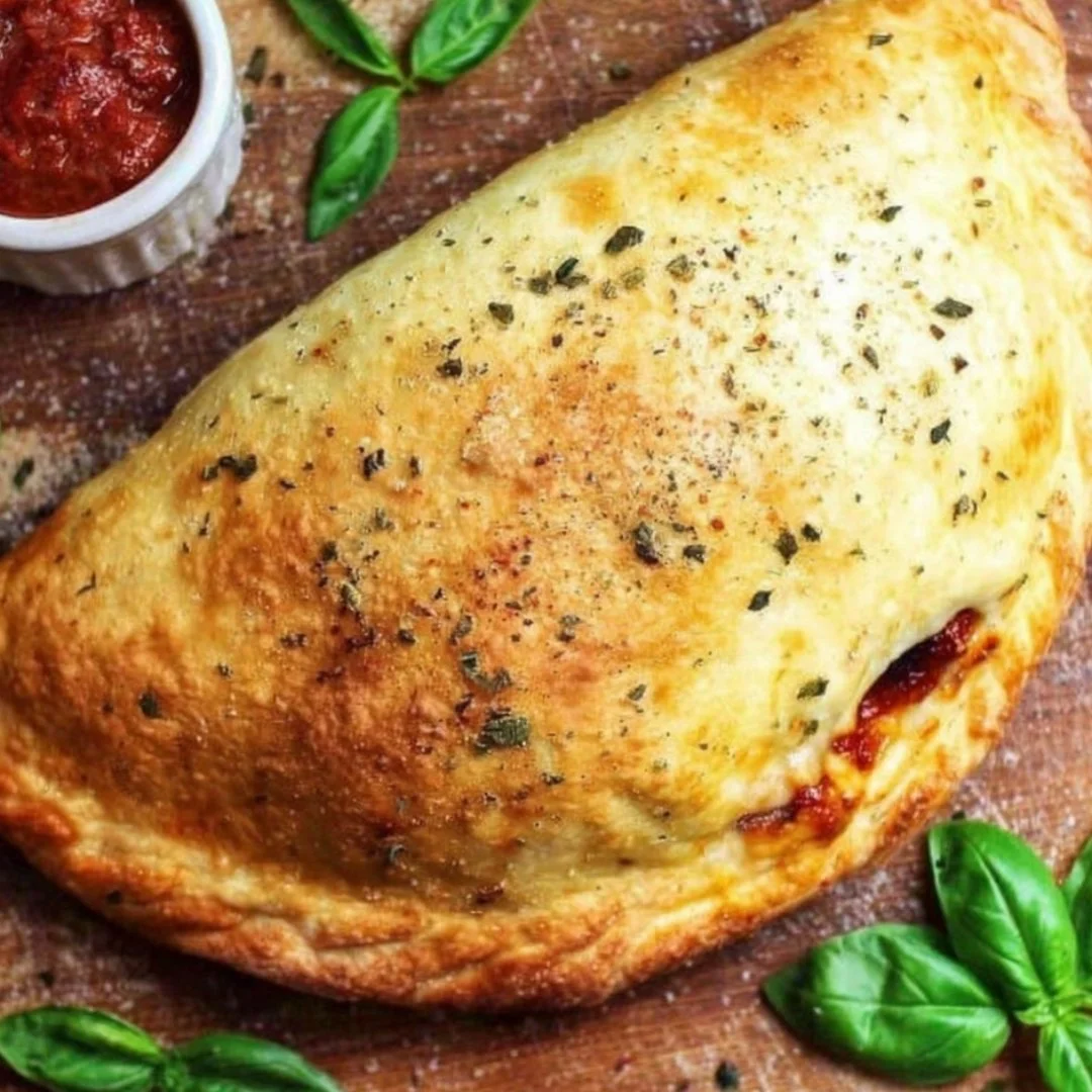 Delicious homemade Keto Calzone with cheese and veggies, perfect for a low-carb diet.