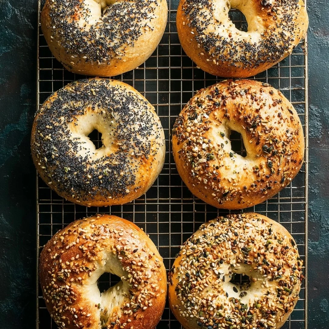 Freshly baked New York style bagels with a golden crust and soft interior.