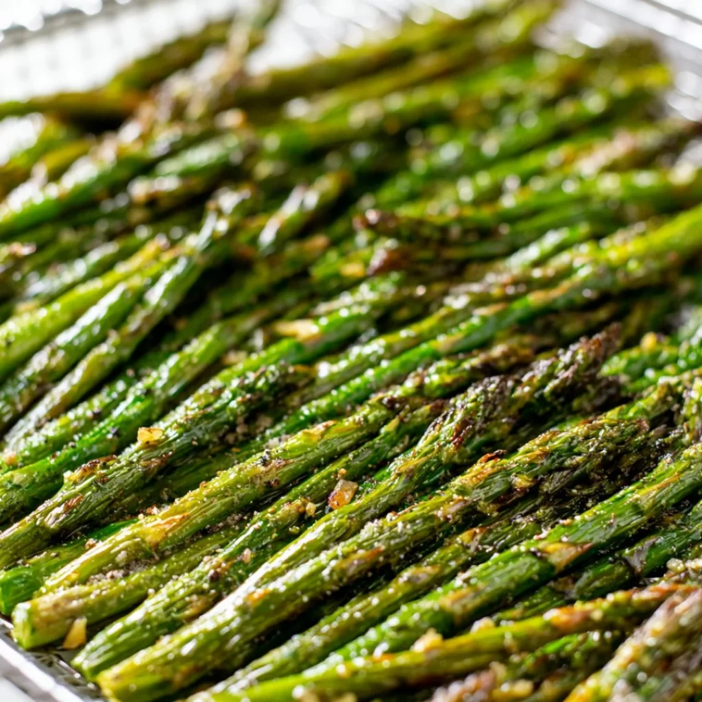 Crispy and flavorful air fryer asparagus garnished with lemon
