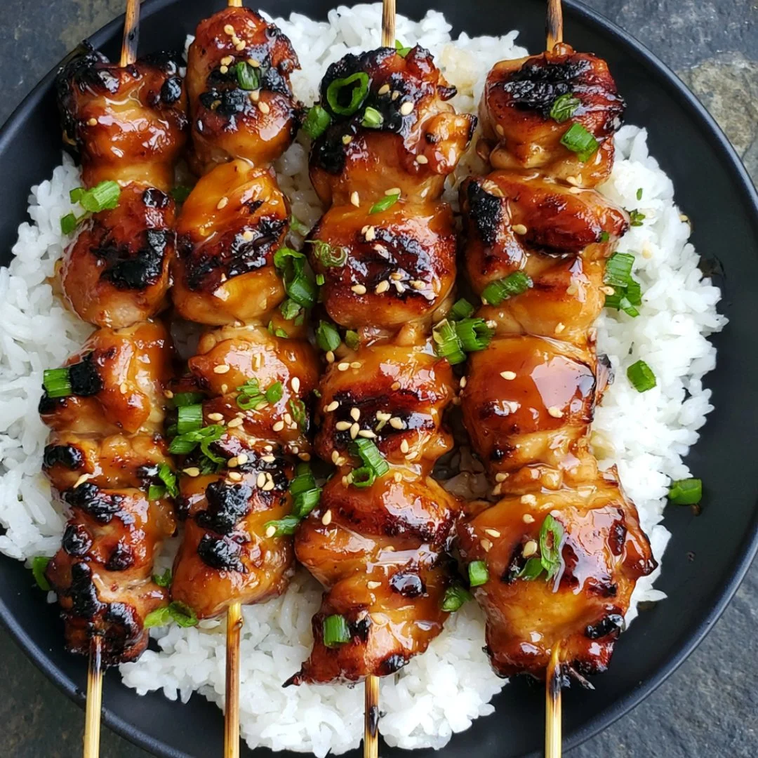 Grilled Teriyaki Chicken Skewers served on a plate with vegetables
