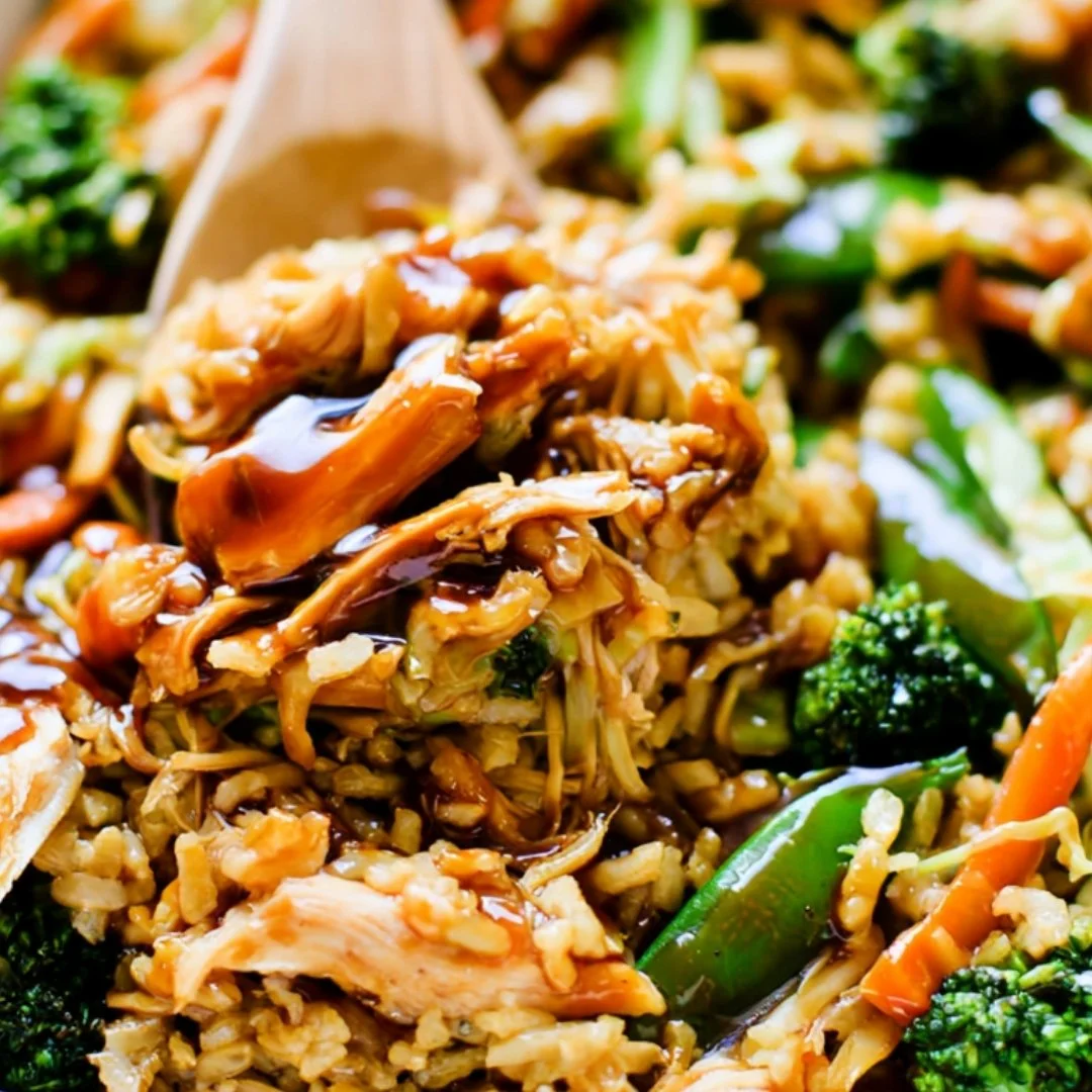 Delicious teriyaki chicken casserole topped with green onions and sesame seeds