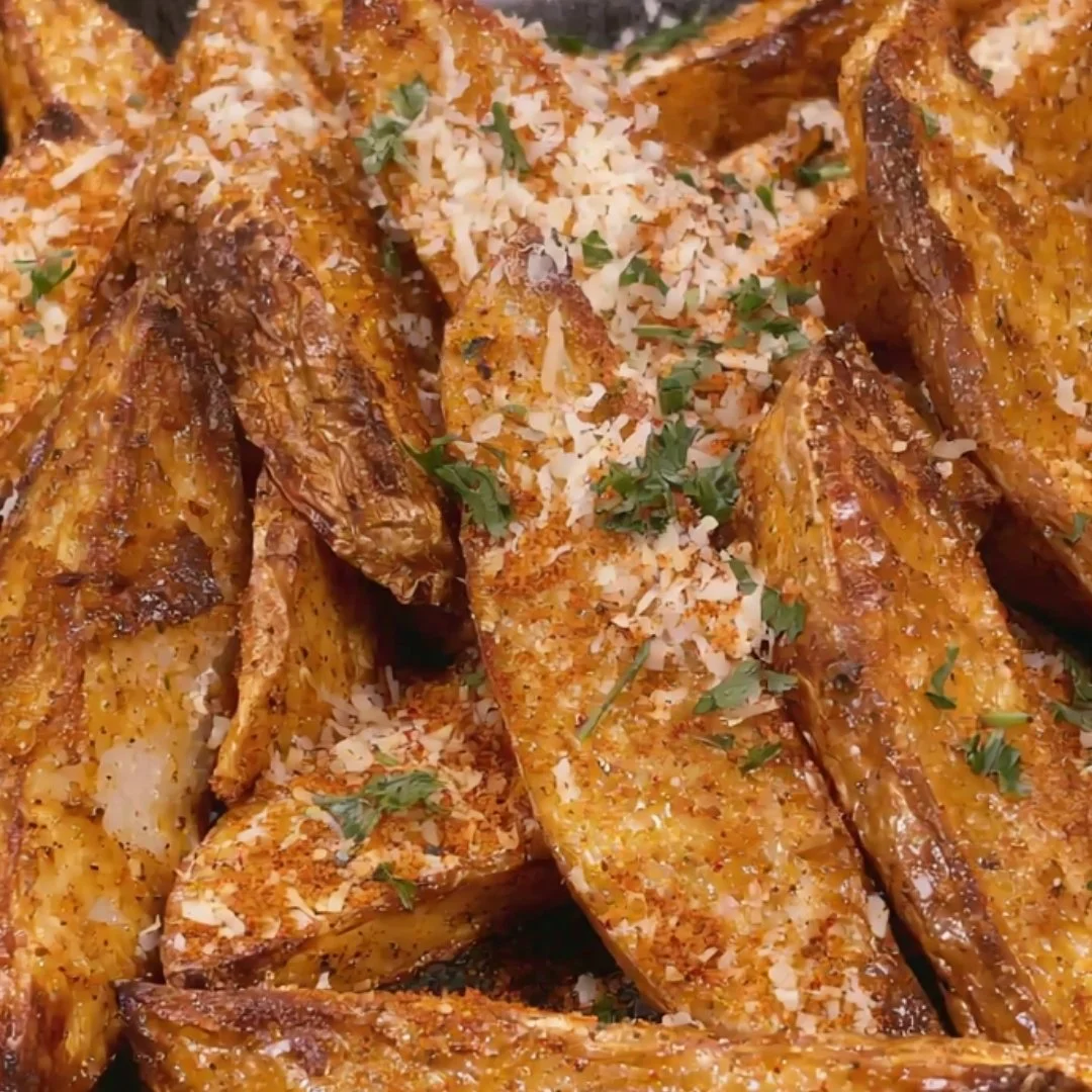 Crispy air fryer potato wedges served with dipping sauce